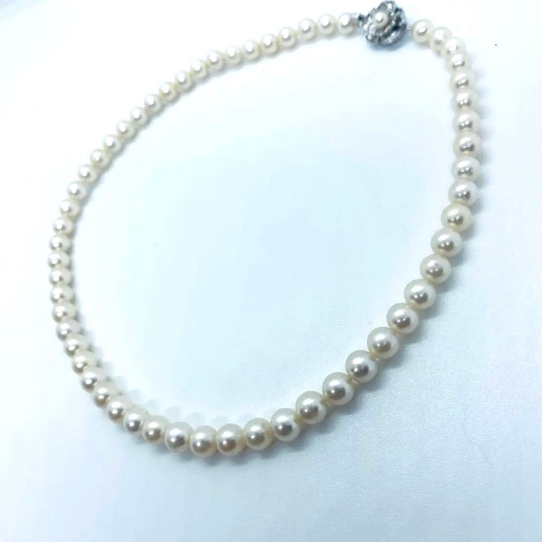 Akoya pearl necklace 7mm to 8mm size, 44 centimeters long, white to creamy pearls with silver beans one-touch clasp