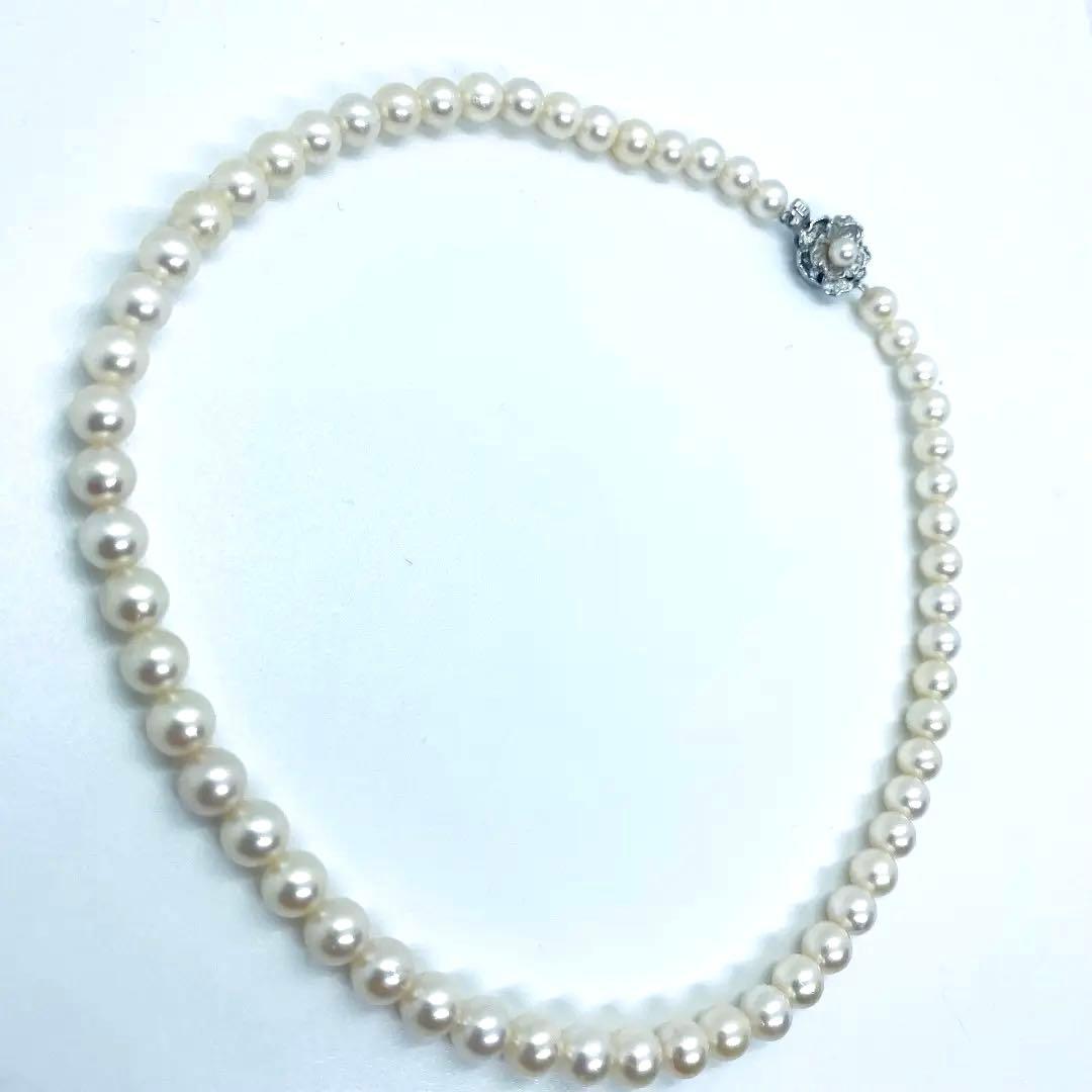 Akoya pearl necklace 7mm to 8mm size, 44 centimeters long, white to creamy pearls with silver beans one-touch clasp