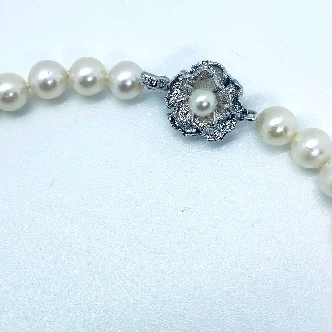 Akoya pearl necklace 7mm to 8mm size, 44 centimeters long, white to creamy pearls with silver beans one-touch clasp