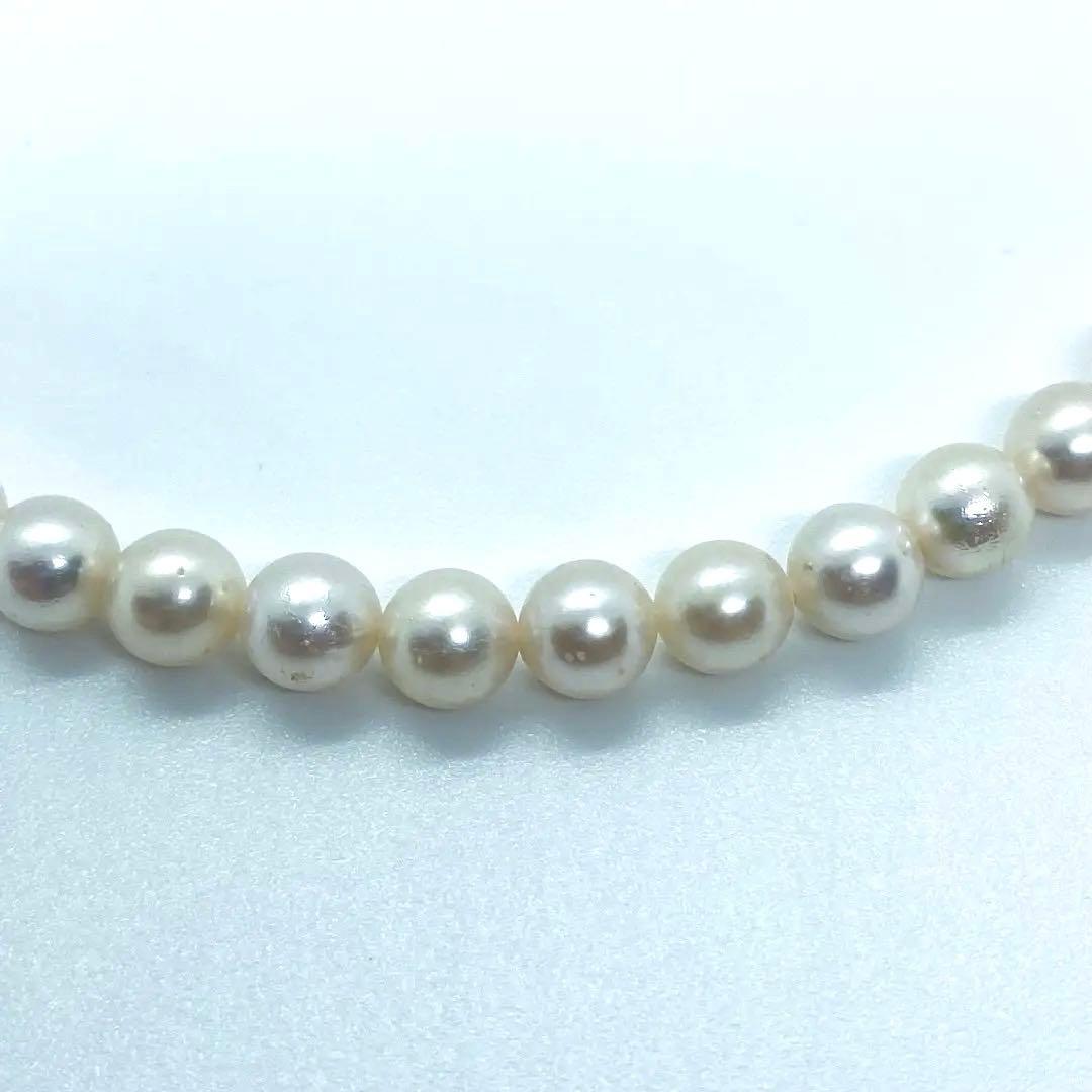 Akoya pearl necklace 7mm to 8mm size, 44 centimeters long, white to creamy pearls with silver beans one-touch clasp
