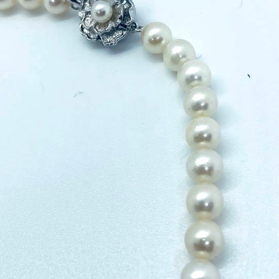 Akoya pearl necklace 7mm to 8mm size, 44 centimeters long, white to creamy pearls with silver beans one-touch clasp