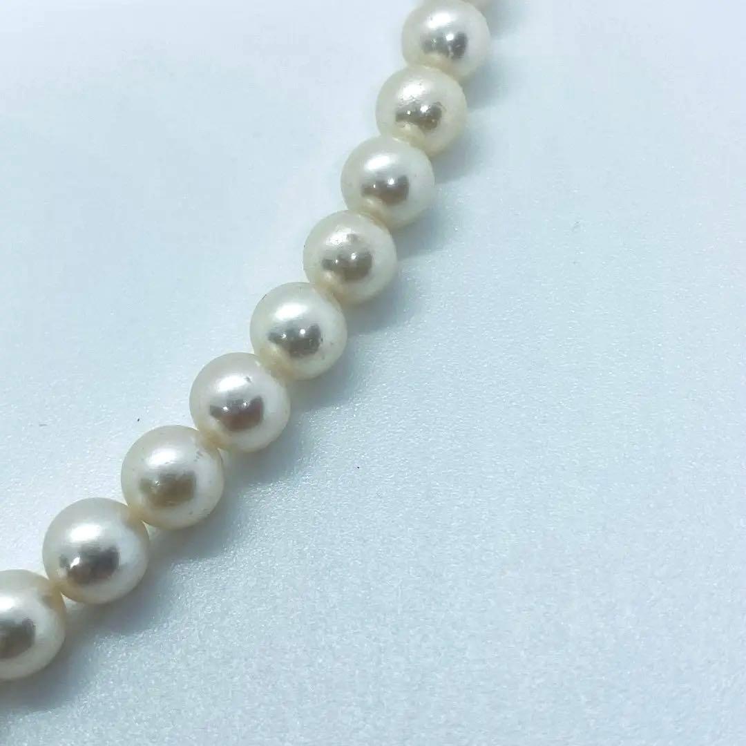Akoya pearl necklace 7mm to 8mm size, 44 centimeters long, white to creamy pearls with silver beans one-touch clasp