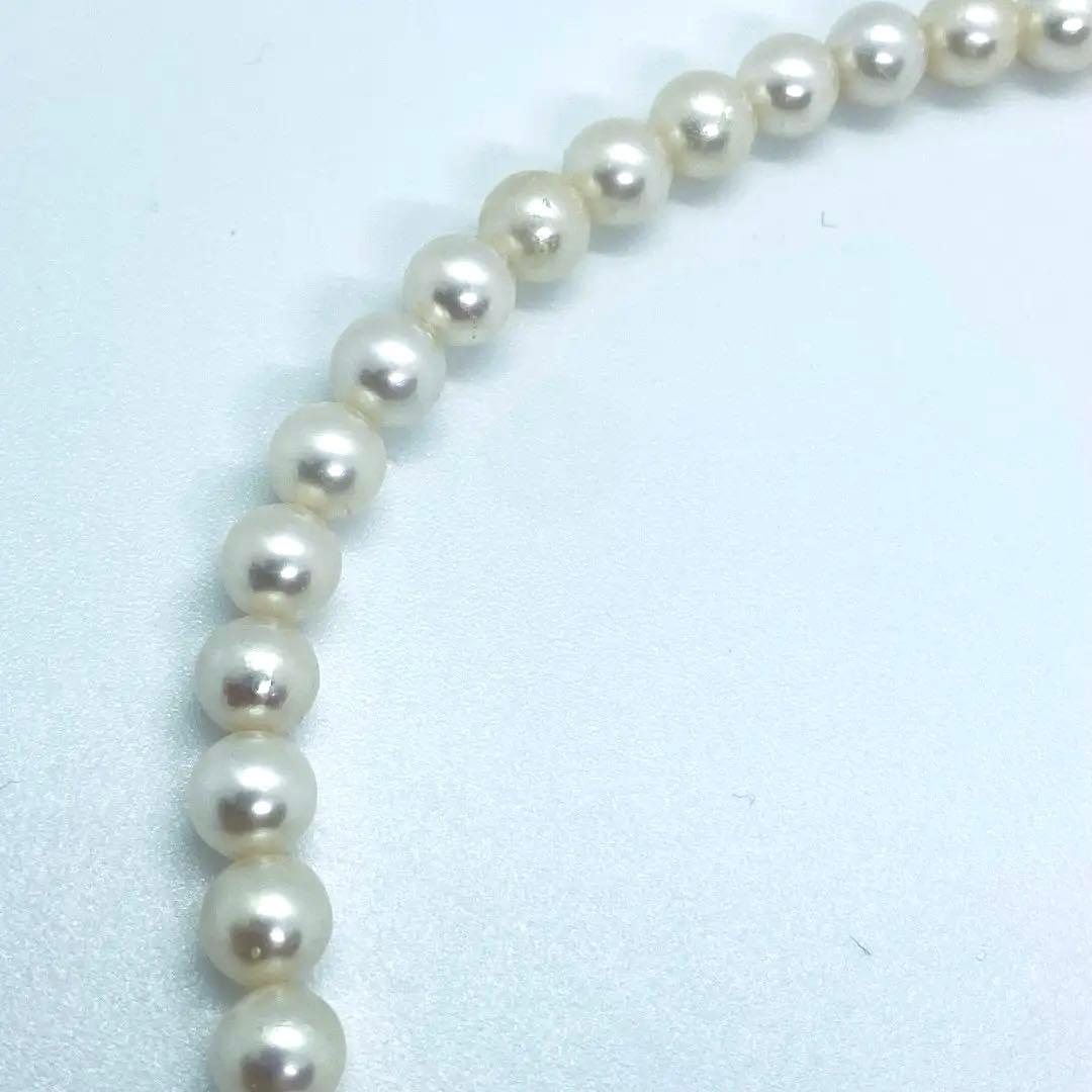 Akoya pearl necklace 7mm to 8mm size, 44 centimeters long, white to creamy pearls with silver beans one-touch clasp
