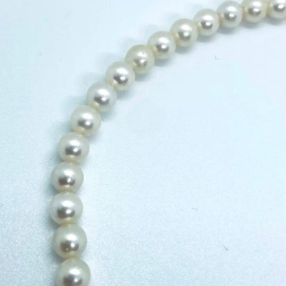 Akoya pearl necklace 7mm to 8mm size, 44 centimeters long, white to creamy pearls with silver beans one-touch clasp