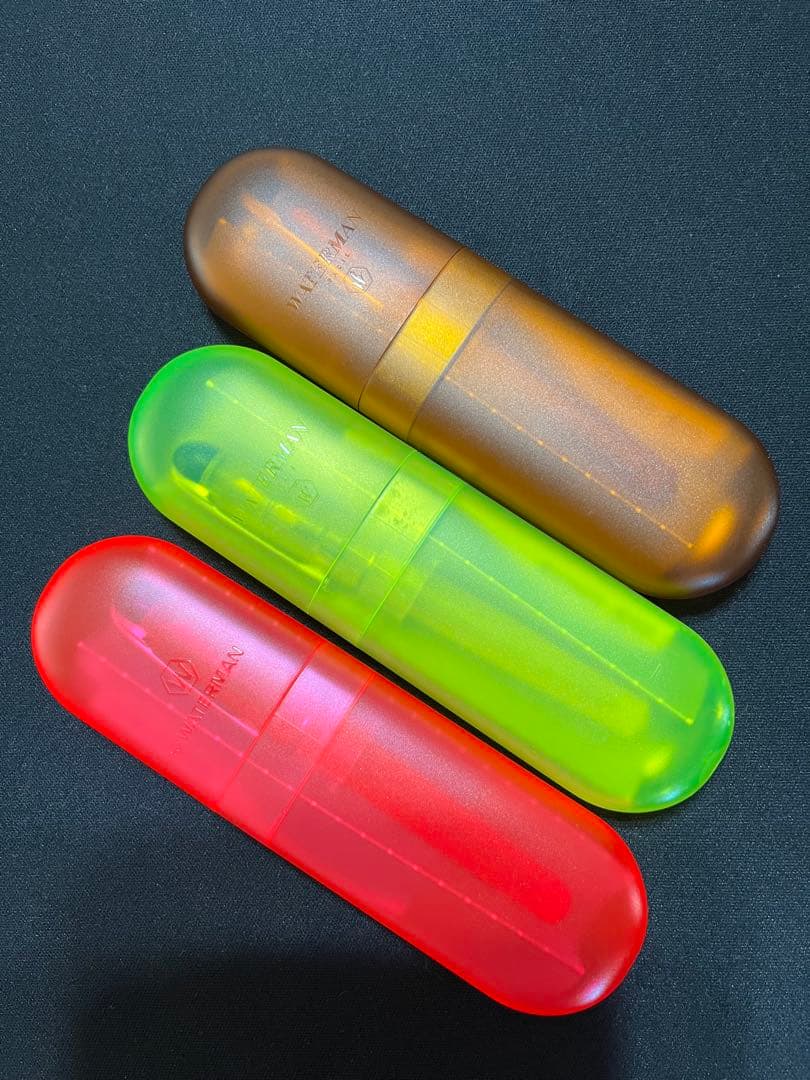 Three Waterman Cultuur Light Soft fountain pens in pink, yellow, and amber with ink cartridges included in original box