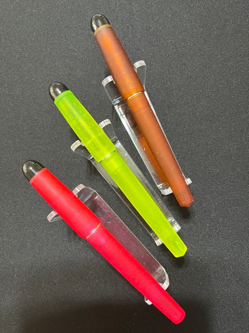 Three Waterman Cultuur Light Soft fountain pens in pink, yellow, and amber with ink cartridges included in original box