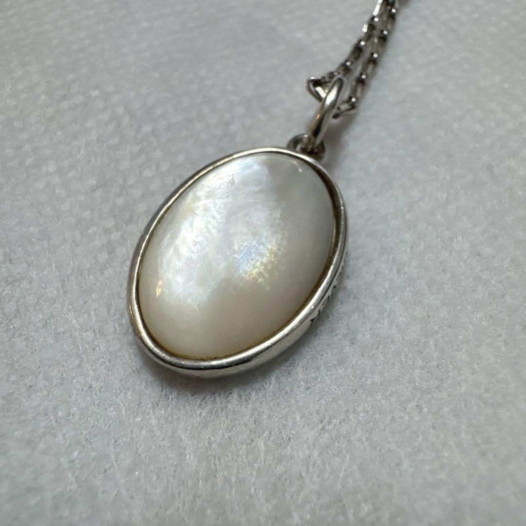 agete silver pendant charm featuring white pearl shell with included 925 silver chain
