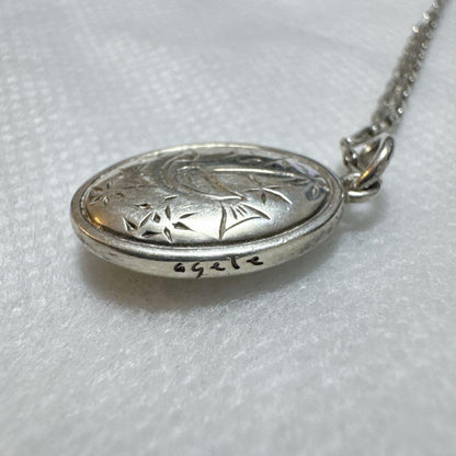 agete silver pendant charm featuring white pearl shell with included 925 silver chain