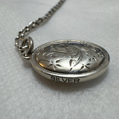 agete silver pendant charm featuring white pearl shell with included 925 silver chain