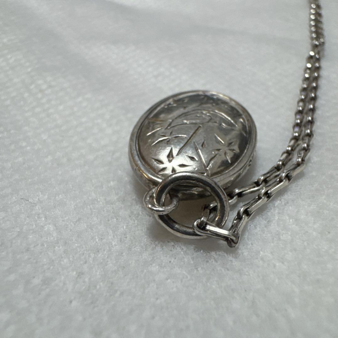 agete silver pendant charm featuring white pearl shell with included 925 silver chain