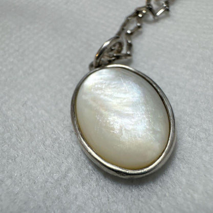 agete silver pendant charm featuring white pearl shell with included 925 silver chain