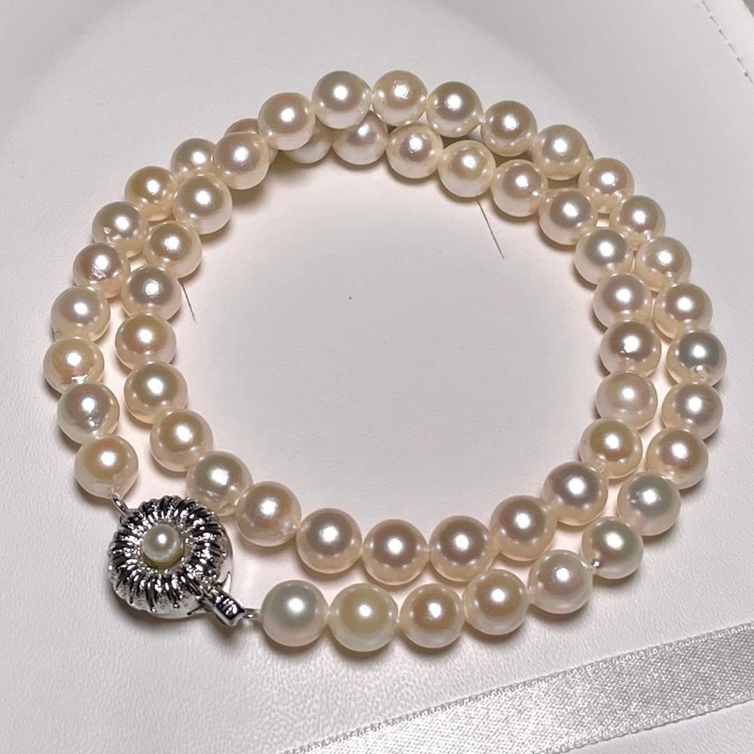 Oyster Akoya pearl necklace with 7.0-7.4mm white round pearls on 42.6cm silver chain marked SILVER