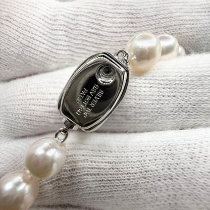 Yamato Akoya Pearl necklace with 7mm pearls on a 40.5 cm chain displayed on a white background