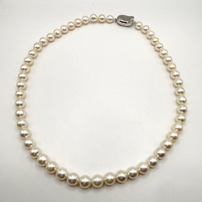 Yamato Akoya Pearl necklace with 7mm pearls on a 40.5 cm chain displayed on a white background