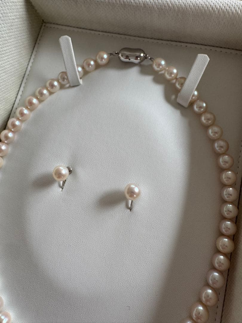 Akoya pearl necklace and earring set with round white pink Hanadama pearls and silver clasps