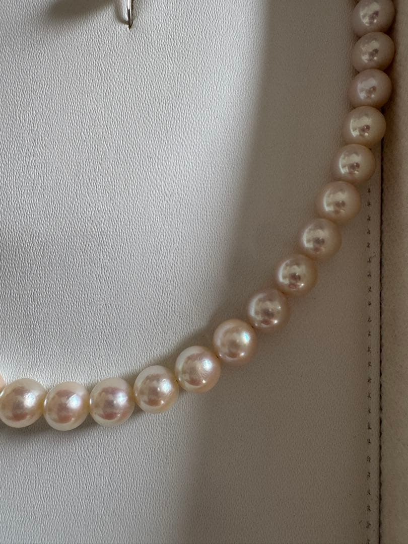 Akoya pearl necklace and earring set with round white pink Hanadama pearls and silver clasps