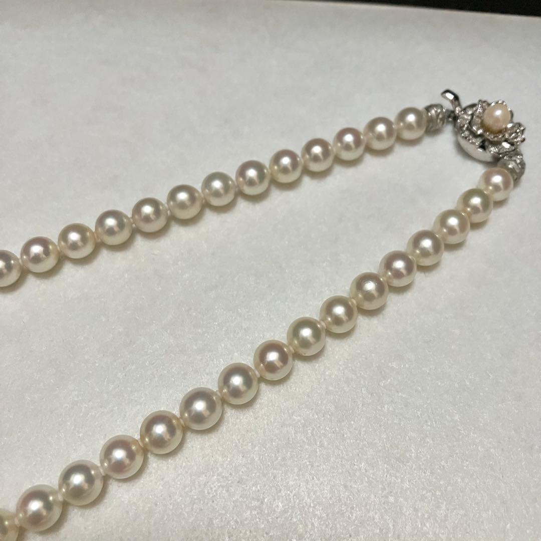 Akoya pearl necklace with 6.5-7.0mm genuine pearls, 45.5cm length, displayed on a white background