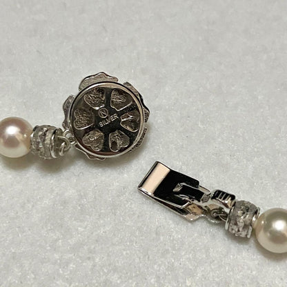 Akoya pearl necklace with 6.5-7.0mm genuine pearls, 45.5cm length, displayed on a white background