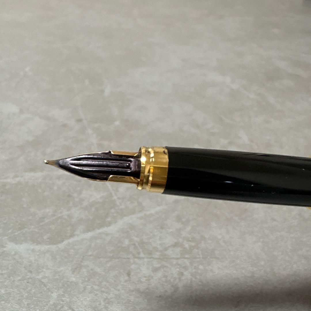 Pilot Cavalier fountain pen in dark brown with gold trim and capped nib on white background