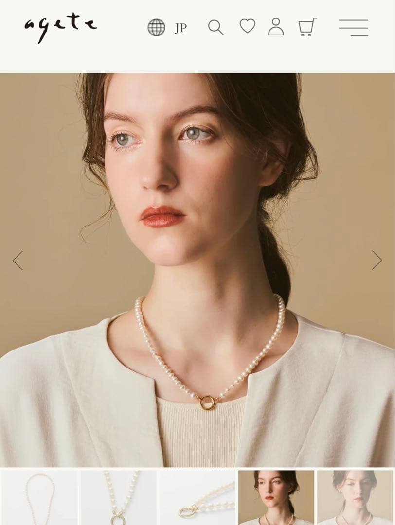 Agete pearl necklace featuring lustrous freshwater pearls displayed with gift box and guarantee card