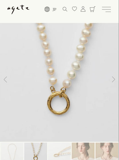 Agete pearl necklace featuring lustrous freshwater pearls displayed with gift box and guarantee card