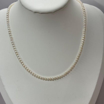 Akoya pearl necklace featuring baby pearls 3-3.5mm with a sterling silver clasp