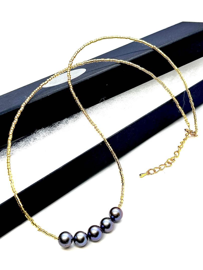 Akoya pearl necklace with blue black pearls measuring 7.8-8.3mm on a 52cm length strand