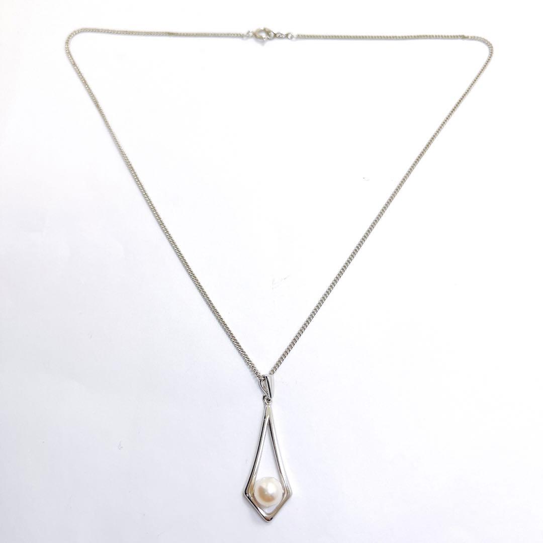 MIKIMOTO silver necklace pendant featuring a 7mm pearl on a 43cm chain weighing 4.6 grams
