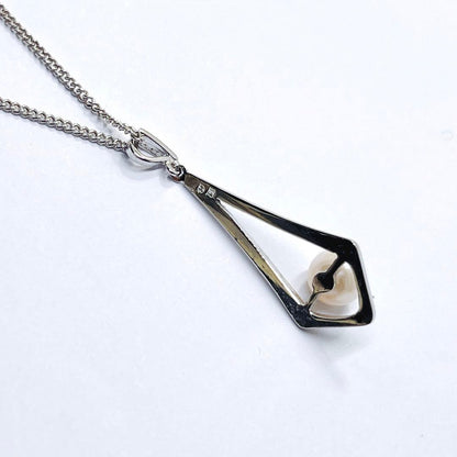 MIKIMOTO silver necklace pendant featuring a 7mm pearl on a 43cm chain weighing 4.6 grams