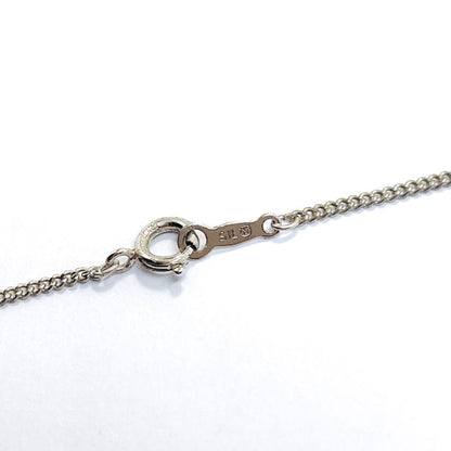 MIKIMOTO silver necklace pendant featuring a 7mm pearl on a 43cm chain weighing 4.6 grams