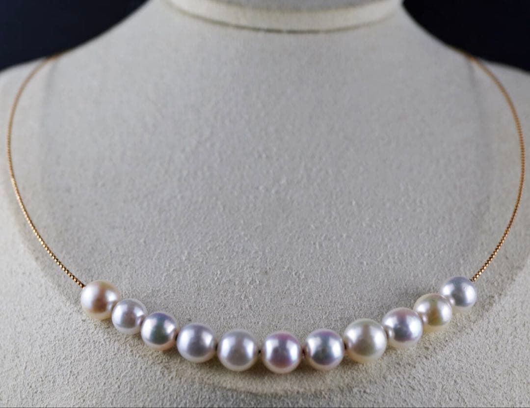 Akoya pearl necklace with 11 round pearls sized 7.5-8.5mm in white pink, gray, and champagne gold on K18 omega chain