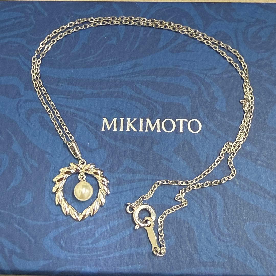 Mikimoto silver pearl necklace with 37.5 cm length displayed on white background
