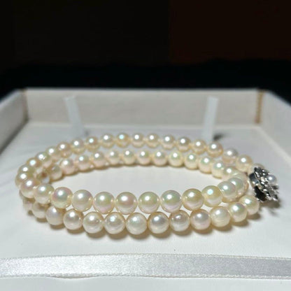 Akoya pearl necklace with 6.5-7mm round white pearls and silver clasp, 42.5 cm length