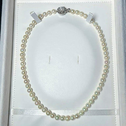 Akoya pearl necklace with 6.5-7mm round white pearls and silver clasp, 42.5 cm length