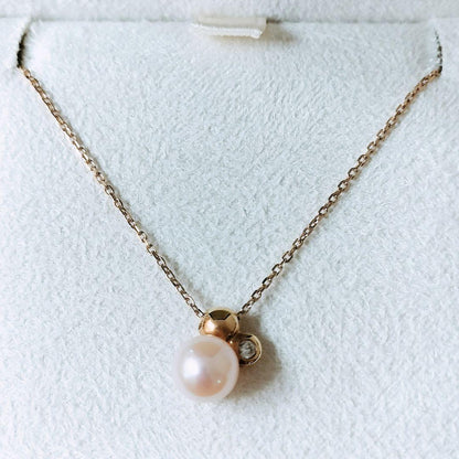 Mikimoto Perlezza necklace with 6mm Akoya pearls and diamonds on 18K yellow gold chain, 40 cm length