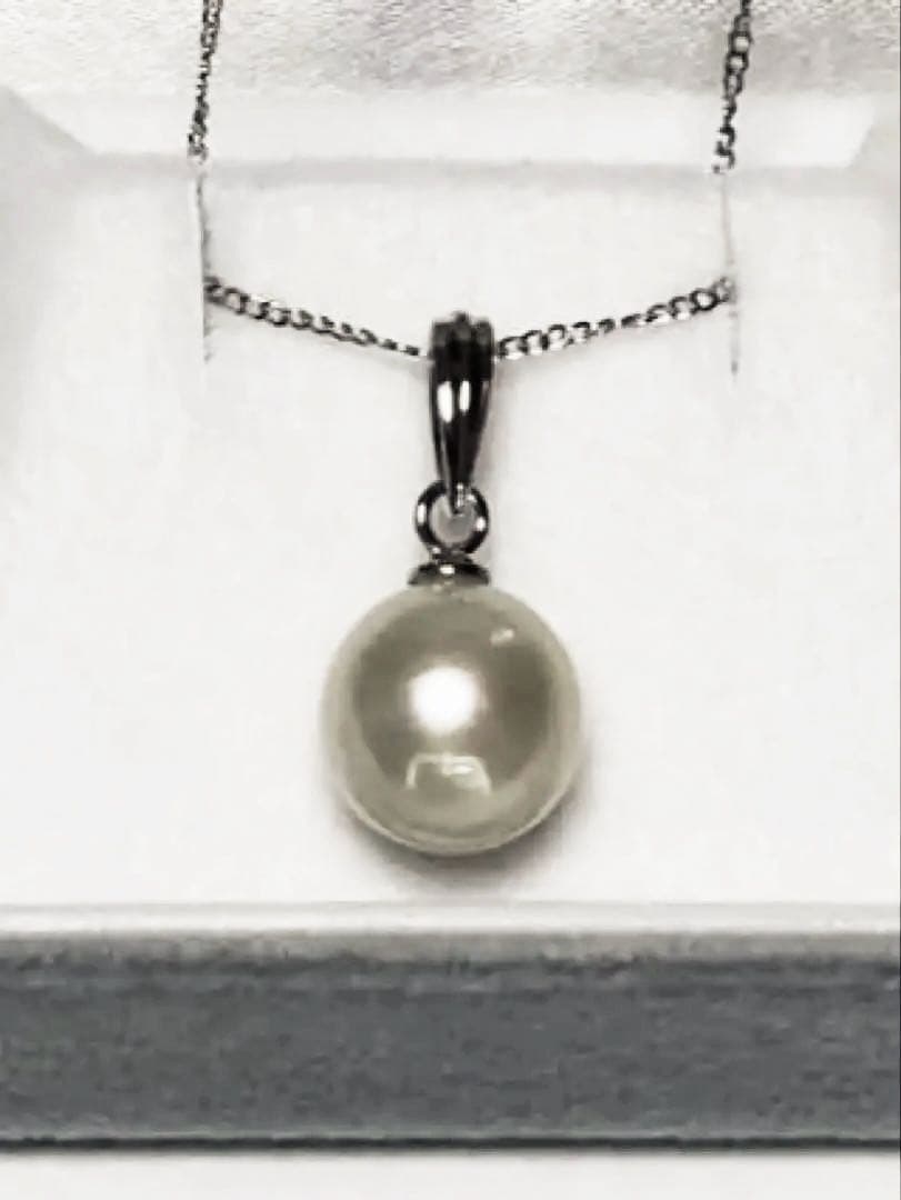 White Akoya Pearl Pendant Top featuring a 9.4mm white pearl with silver pendant banger and hallmark