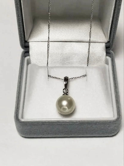 White Akoya Pearl Pendant Top featuring a 9.4mm white pearl with silver pendant banger and hallmark