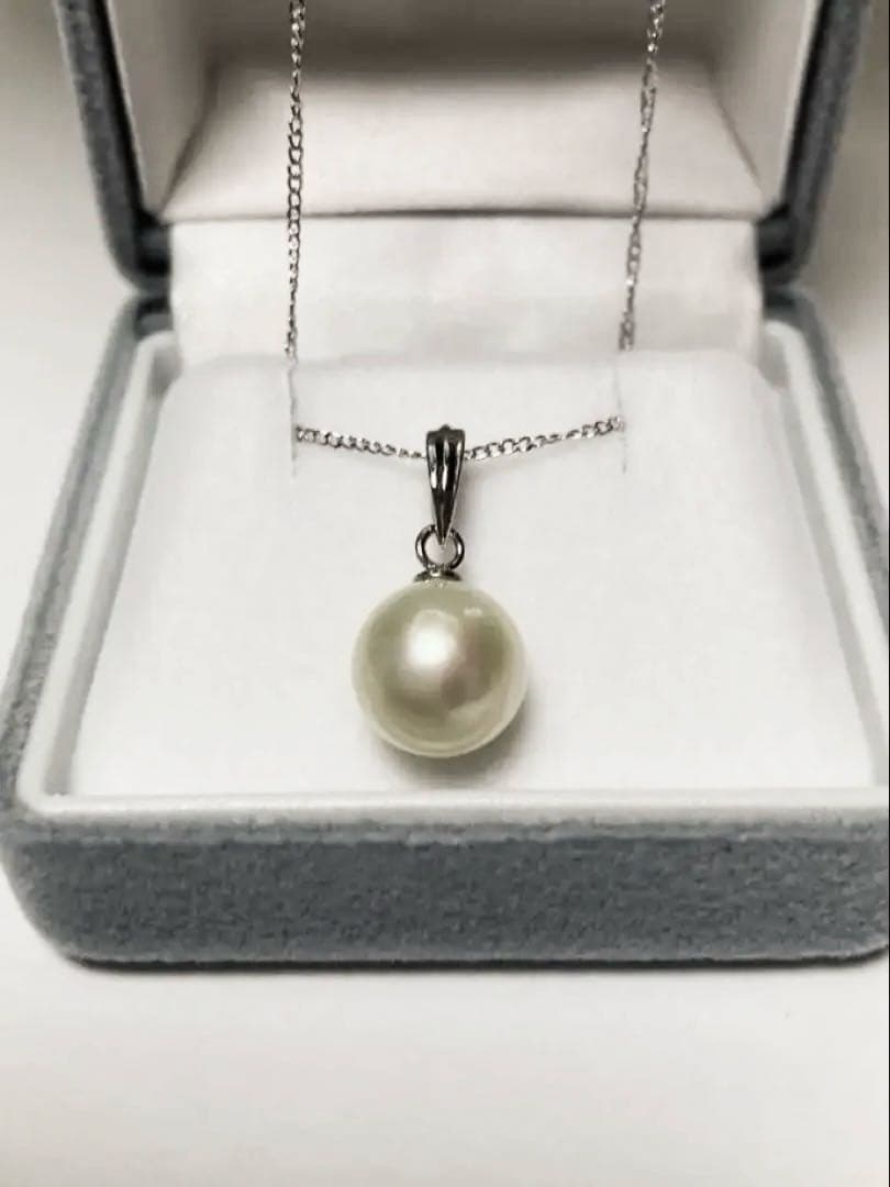 White Akoya Pearl Pendant Top featuring a 9.4mm white pearl with silver pendant banger and hallmark