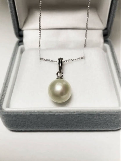 White Akoya Pearl Pendant Top featuring a 9.4mm white pearl with silver pendant banger and hallmark