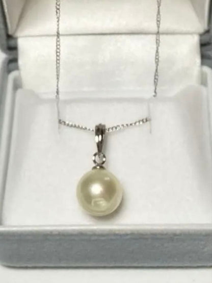 White Akoya Pearl Pendant Top featuring a 9.4mm white pearl with silver pendant banger and hallmark