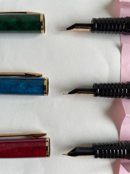 Waterman L'Oreal Paris fountain pen set with green, blue, and red marble finishes length 13 cm
