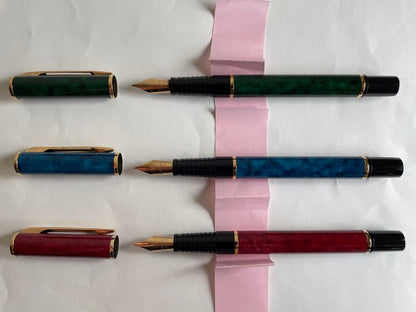 Waterman L'Oreal Paris fountain pen set with green, blue, and red marble finishes length 13 cm
