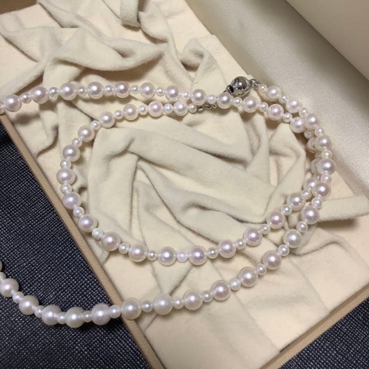 60 centimeter Akoya pearl necklace with pink tone pearls and silver hook closure