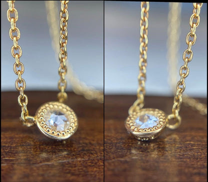 AGETE K18 yellow gold necklace with 0.03 ct rose cut diamond and milgrain detailing on a delicate chain