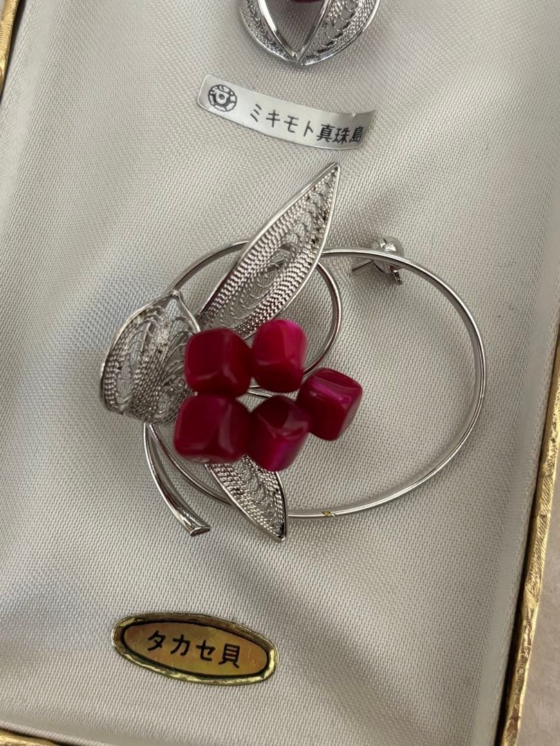 Mikimoto Takase shell necklace and brooch set in new and unopened condition
