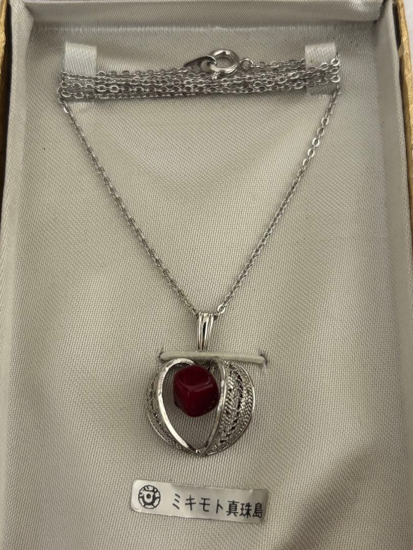 Mikimoto Takase shell necklace and brooch set in new and unopened condition