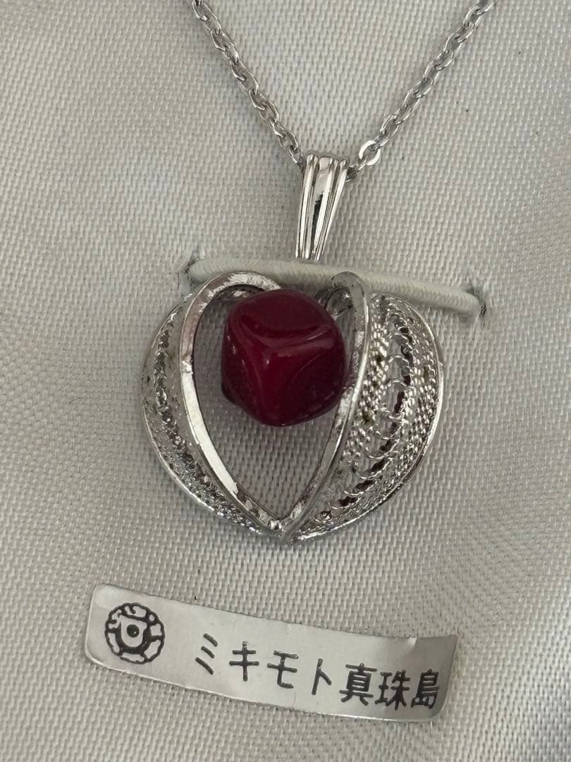 Mikimoto Takase shell necklace and brooch set in new and unopened condition