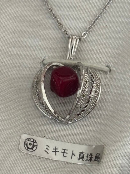 Mikimoto Takase shell necklace and brooch set in new and unopened condition