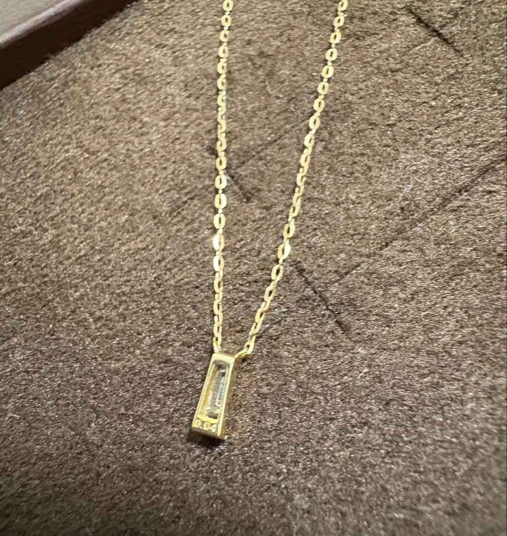 Agete K10 gold necklace with tapered baguette cut diamonds, 39cm length, and delicate pendant