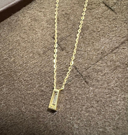 Agete K10 gold necklace with tapered baguette cut diamonds, 39cm length, and delicate pendant